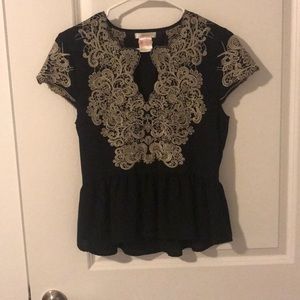 Black peplum top with stitching